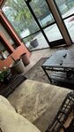 Foxbrook resident's screened patio is covered in black dust from development after heavy winds. Photo by: Kim Bruenner